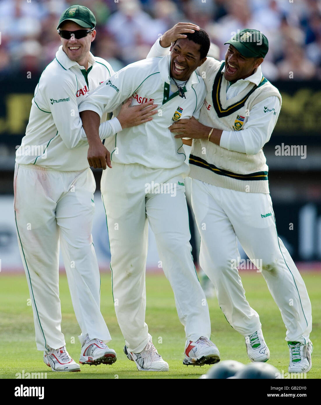 South Africa's Makhaya Ntini celebrates with teammates AB de Villiers and Aswell Prince after dismissing England 's Ian Bell for 20 runs during the Third Test match at Edgbaston, Birmingham. Stock Photo