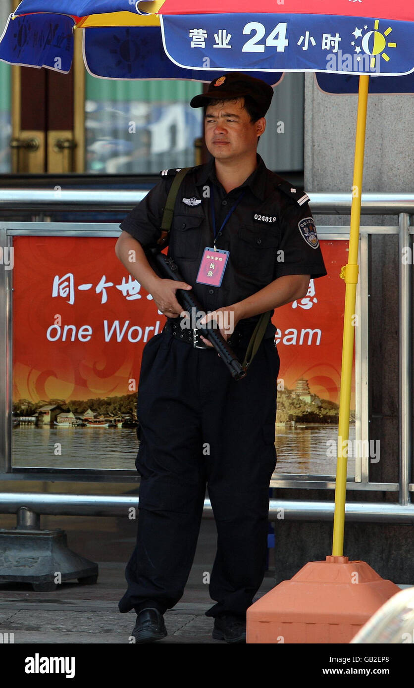Armed police officers at the entrance to Beijing's main railway station, Beijing, China. Stock Photo