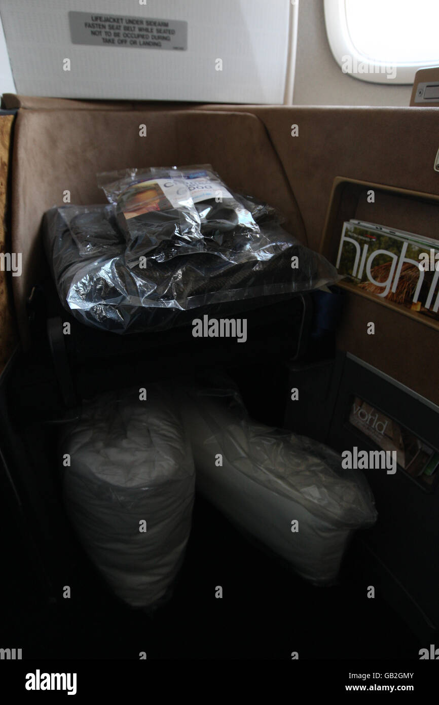 Blankets passengers in first class cabin on british airways boeing hi