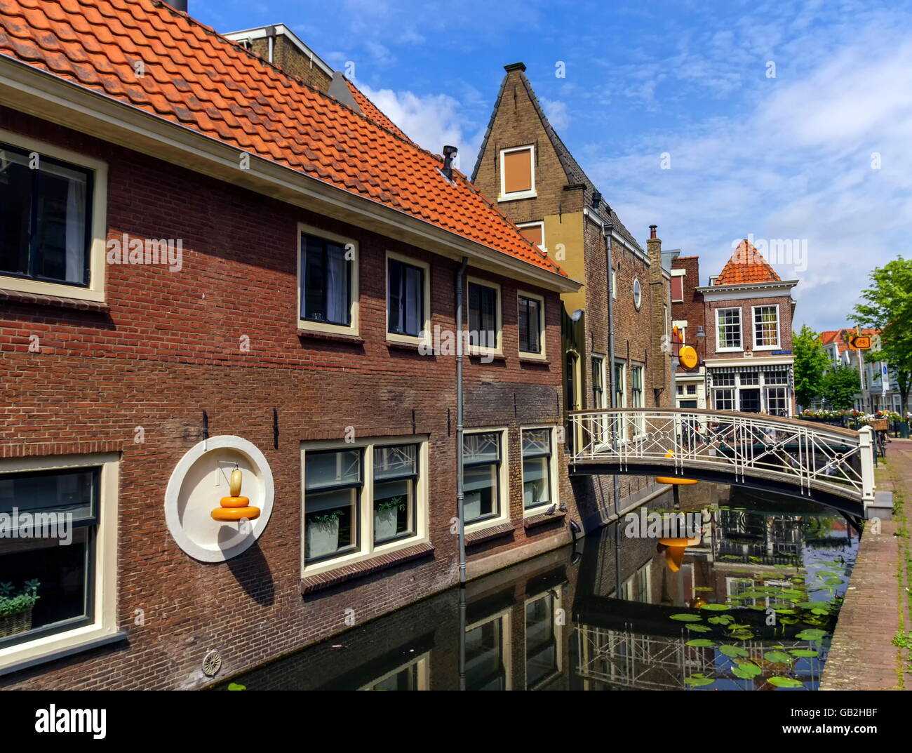 Canal and houses in Gouda by day, Netherlands Stock Photo Alamy
