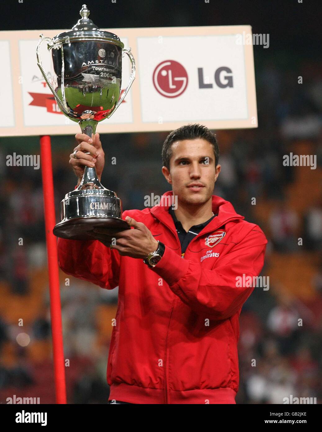 Arsenal's Robin Van Persie celebrates winning the Amsterdam Trophy Stock  Photo - Alamy