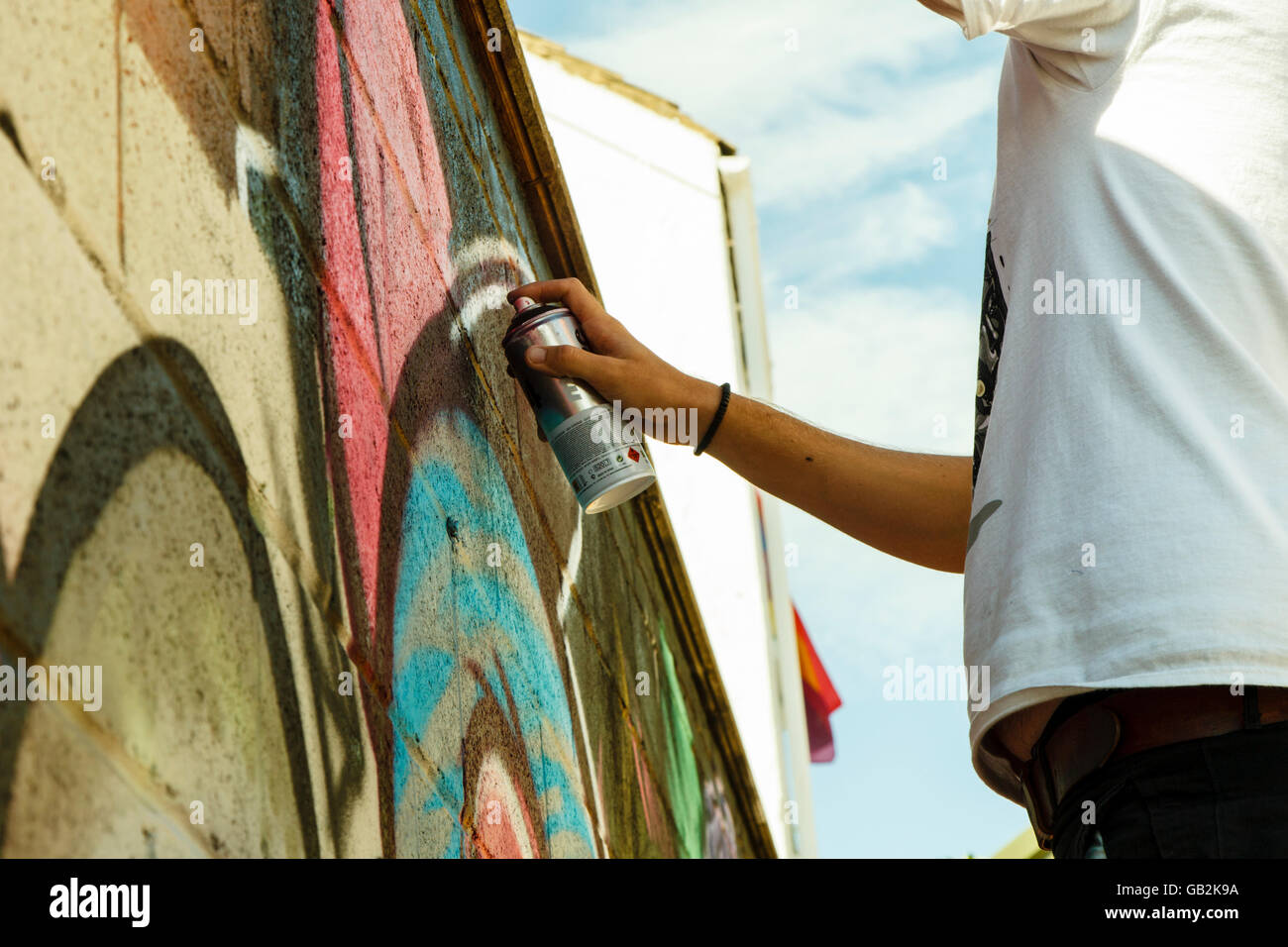 Brighton Graffiti artists painting a wall Stock Photo Alamy