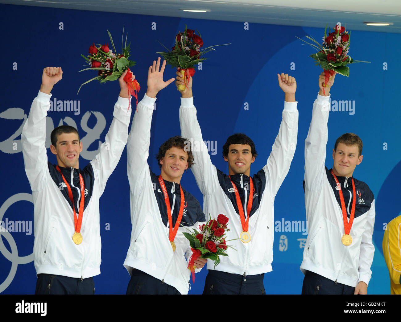 USA's 4x 200m relay team (left to right) Michael Phelps, Ryan Lochte, Ricky Berens and Peter Vanderkaay celebrates with their Gold Medals for the men's 4x200m freestyle relay final at Beijing's National Aquatic Center Stock Photo