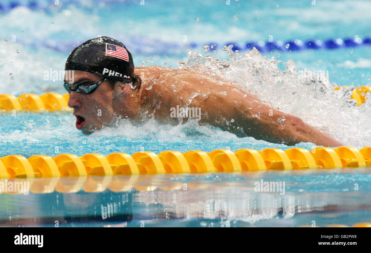 Olympics - Beijing Olympic Games 2008 - Day Seven. United States' Michael Phelps during the men's 100m butterfly semi final at the 2008 Beijing Olympic Games in China. Stock Photo