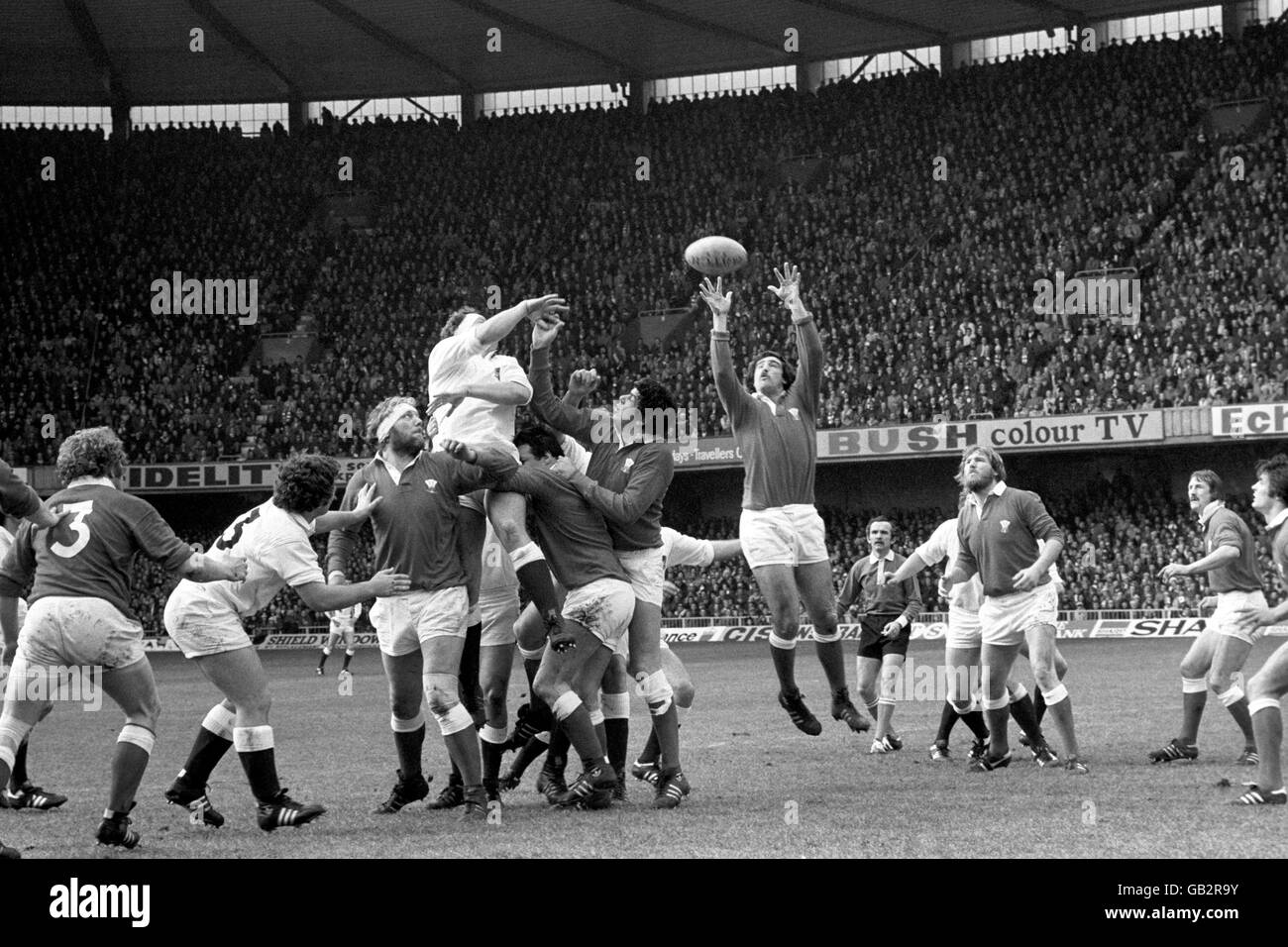 Rugby Union - Five Nations Championship - Wales v England - Cardiff Arms Park. England captain Bill Beaumont palms a lineout ball to Wales' Paul Ringer Stock Photo