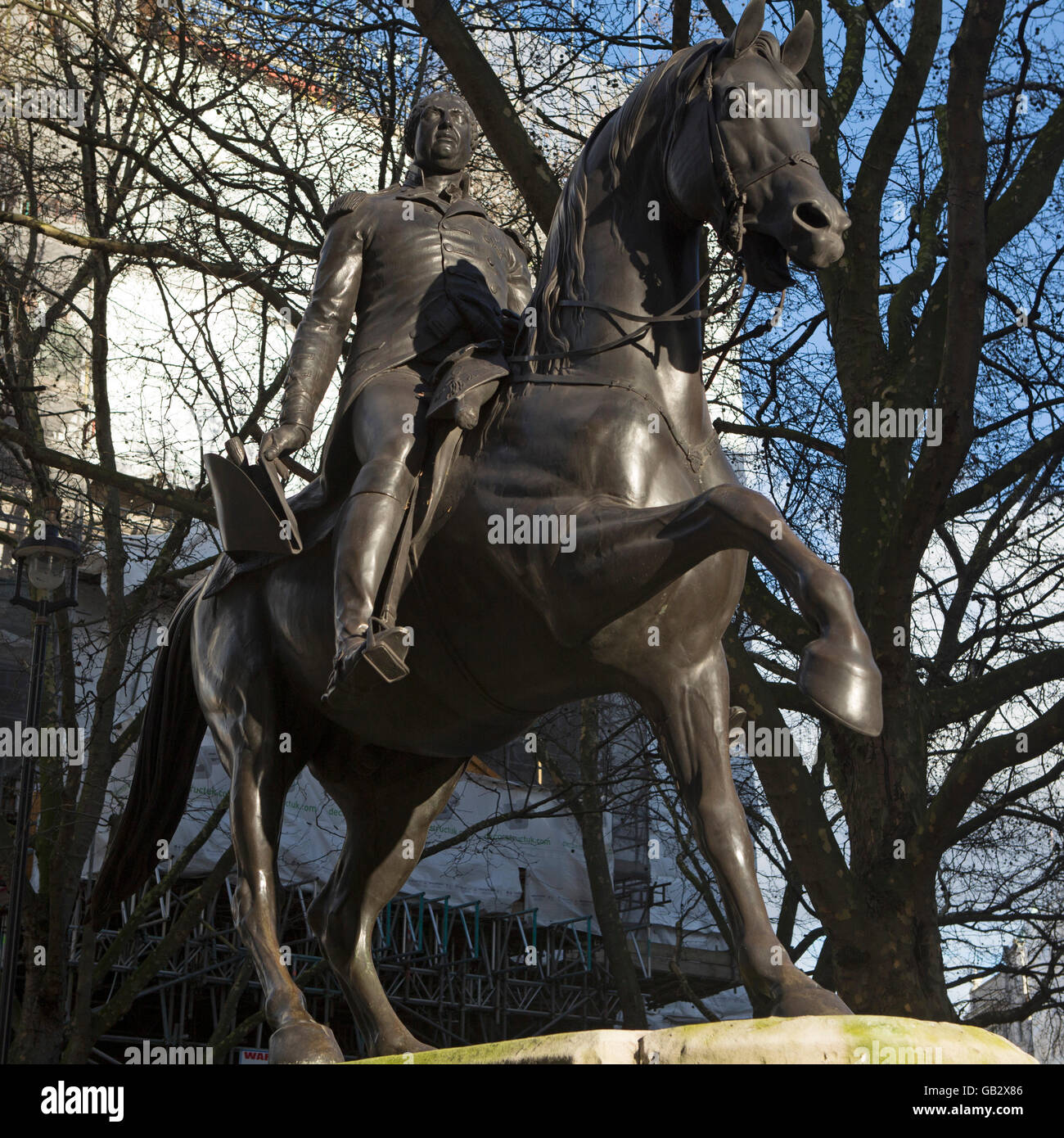 Statue of King George III on Pall Mall in London, England. The king rides a horse. Stock Photo