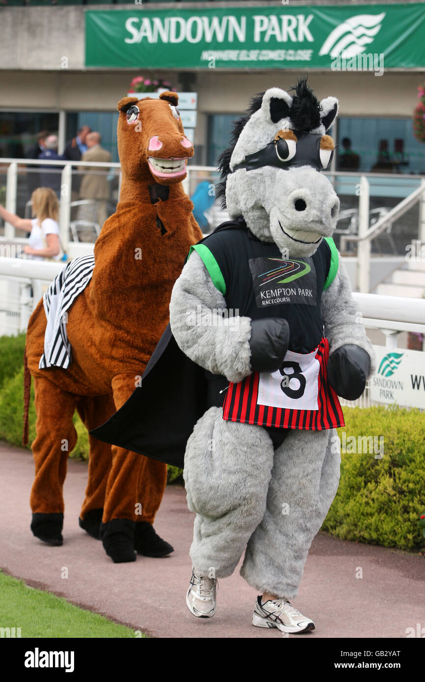 Horse Racing - Comedy Night - Sandown Park. Fancy dress horse racing at Sandown Park Stock Photo