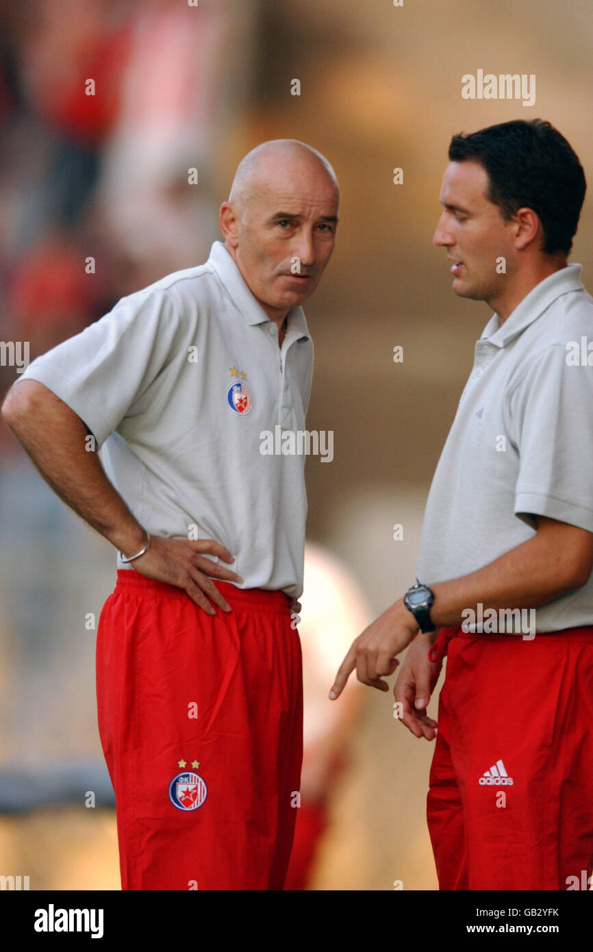 Red Star Belgrade coach Slavoljub Muslin (l) talks tactics Stock Photo