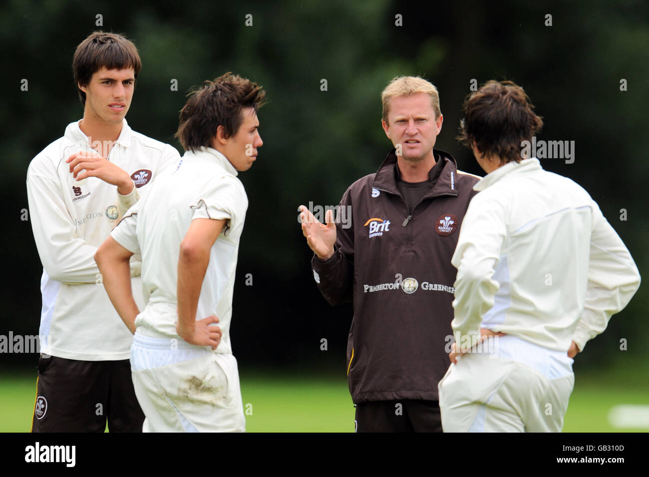 Surrey Academy's coach Gareth Townsend talks to his players Stock Photo