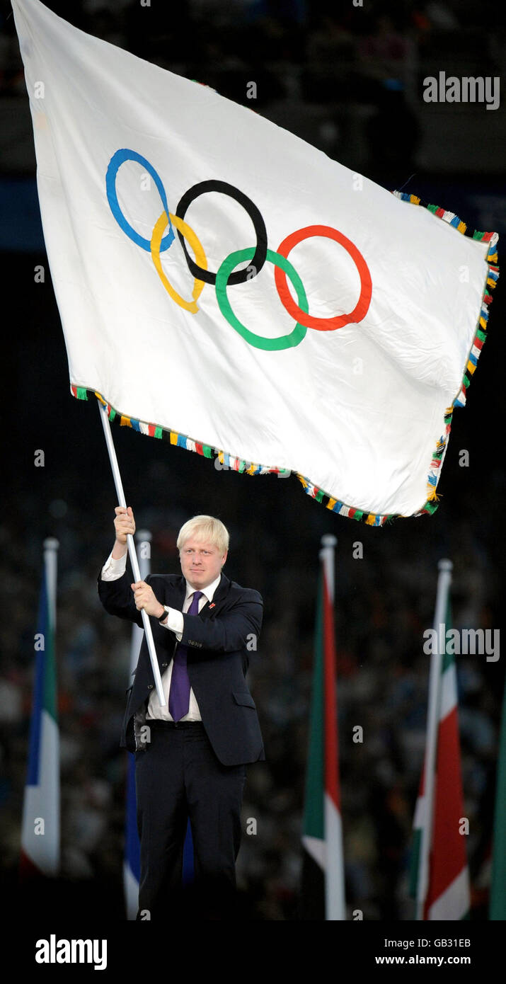 Mayor of London Boris Johnson waves the Olympic Flag during the Closing ...