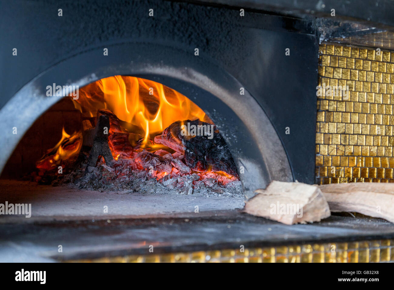 massive oven for pizza on firewood with fire in furnace Stock Photo Alamy