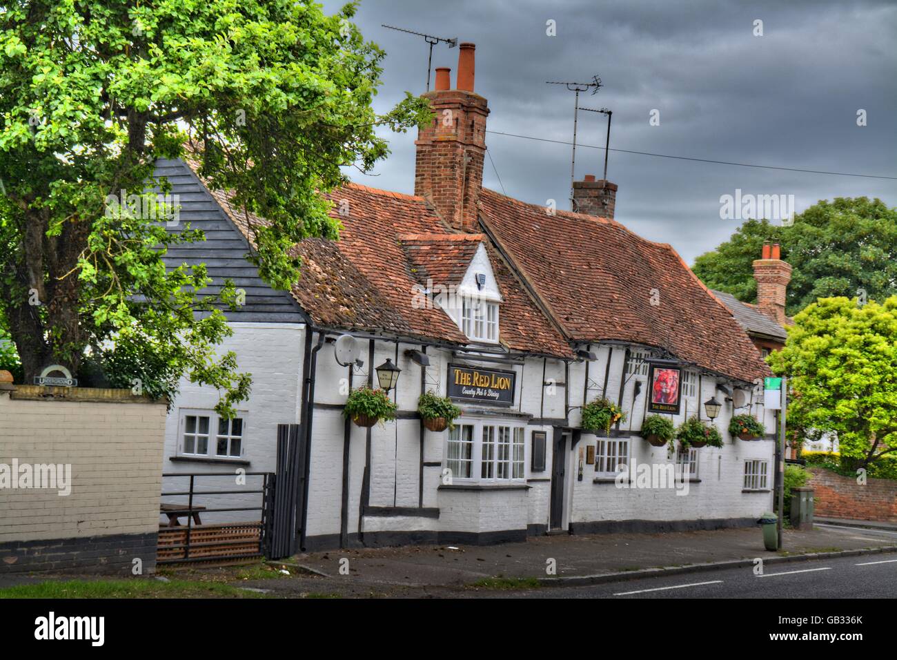 Public house near St Osyths Well, England - Spring of an Saxon princess, famous as red Lion during civil war. some centuries old Stock Photo