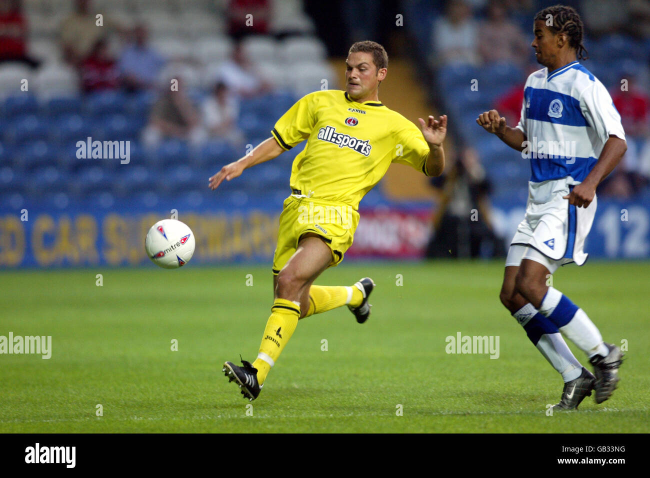 Queen's Park Rangers' Richard Langley (r) and Charlton Athletic's Luke