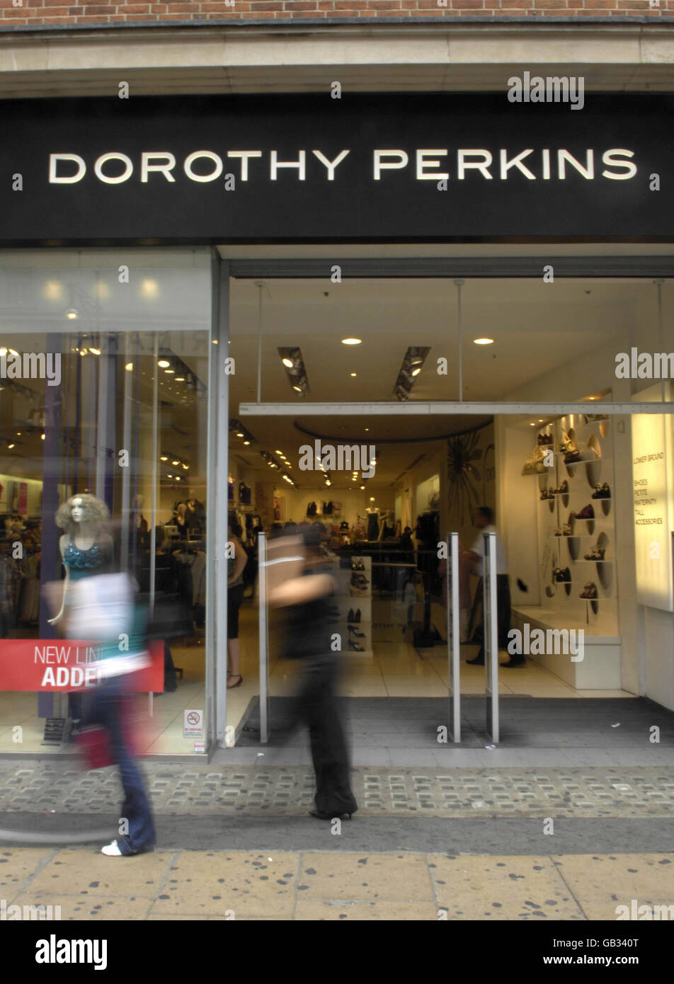 General view of shoppers walking past a Dorothy Perkins store on Oxford  Street in London Stock Photo - Alamy
