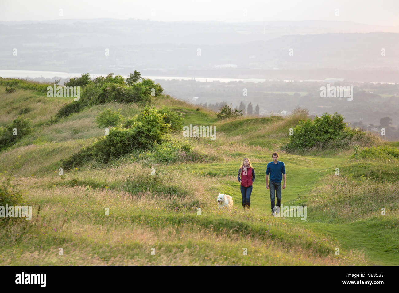 Walking the dog on the Cotswold Way, Cam Long Down, Gloucestershire