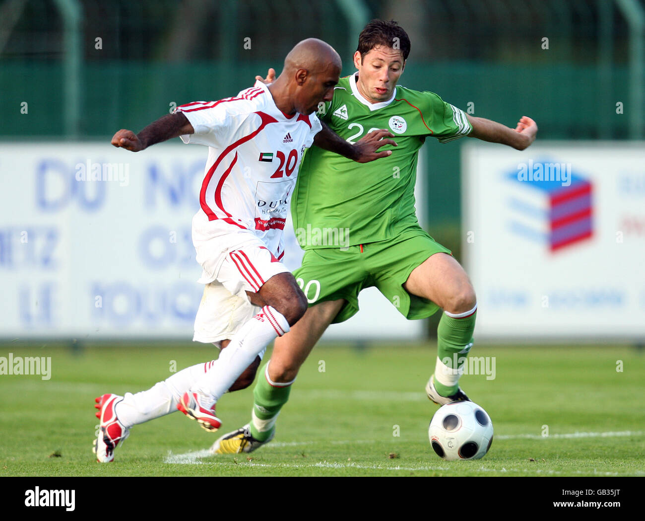 Algeria's Nabil Hemani (right) and United Arab Emirates' Saeed Hilal