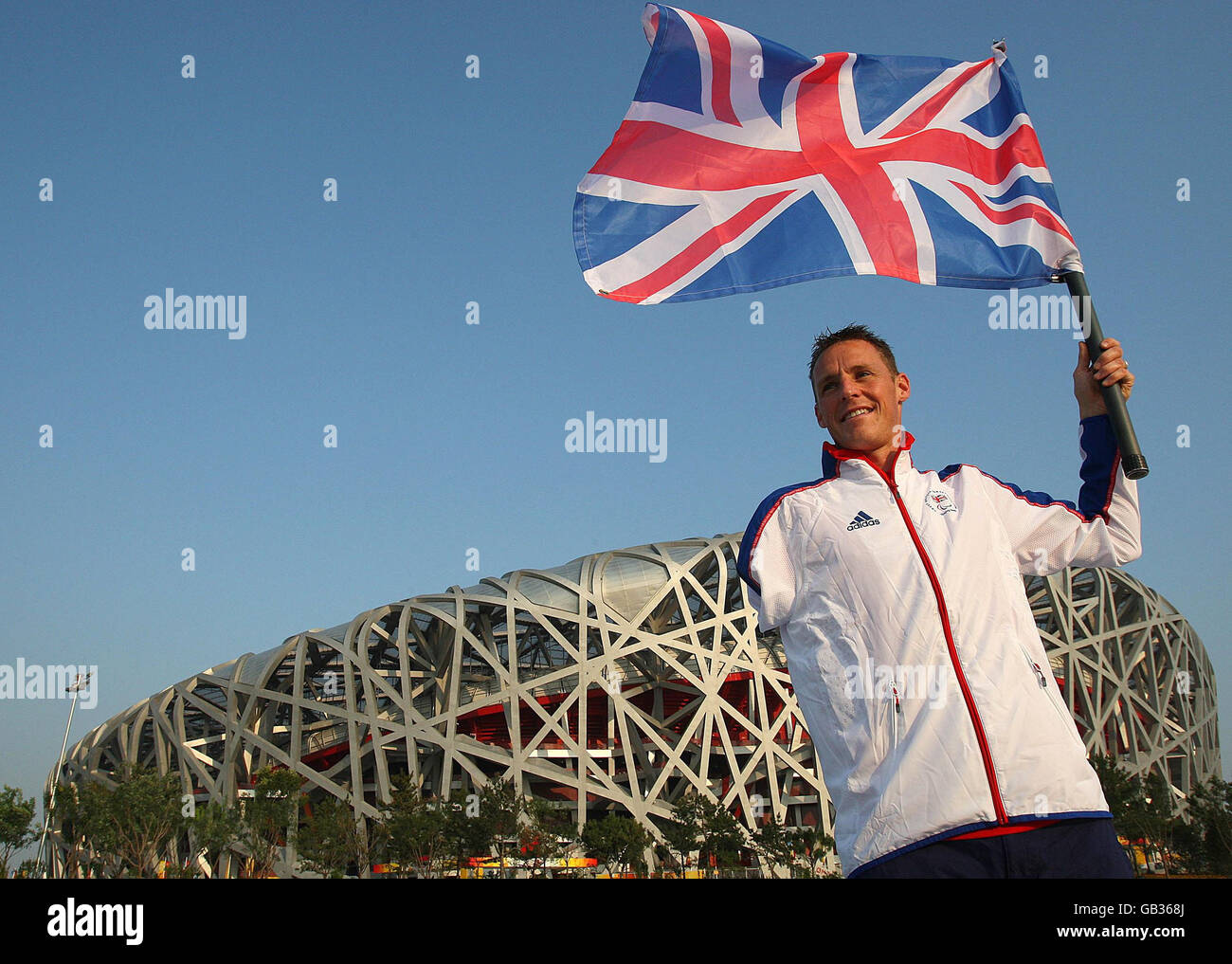 Great Britain's Daniel Crates, member of the Paralympic Athletics Team and the GB Flag Bearer for the opening ceremony outside the National Stadium in Beijing, China. Stock Photo