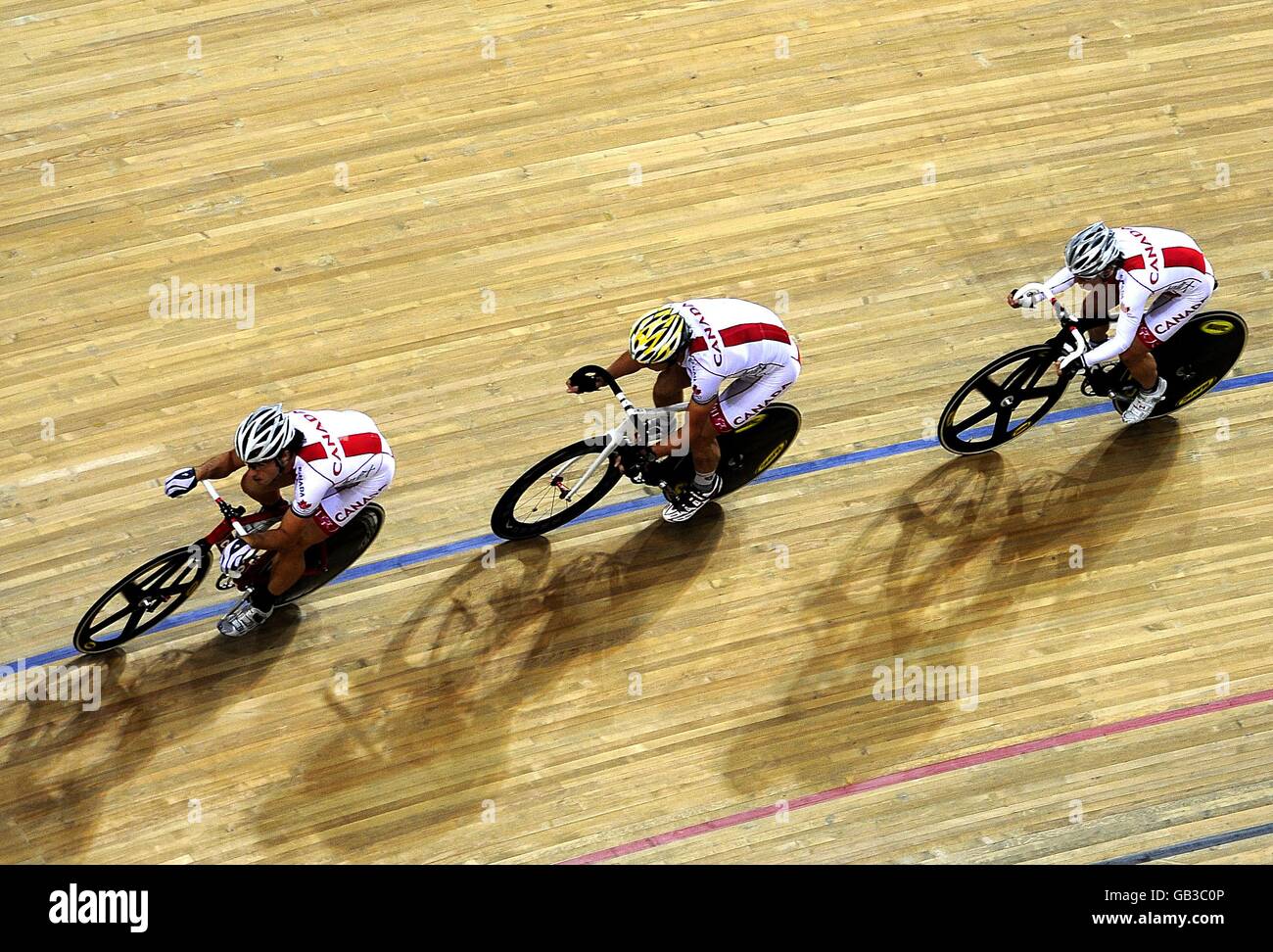 Members of the Canadian Cycling team warm up at the Laoshan Velodrome on day 8 of the 2008 Olympic Games in Beijing. Stock Photo