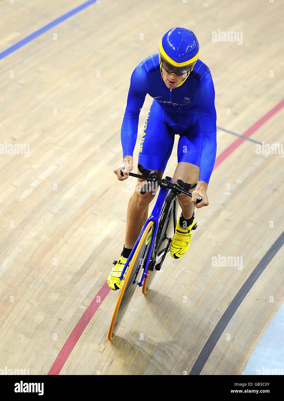 Ukraine's Volodymyr Dyudya competes in the Men's Individual Pursuit First Round at the Laoshan Velodrome on day 8 of the 2008 Olympic Games in Beijing.2 Stock Photo
