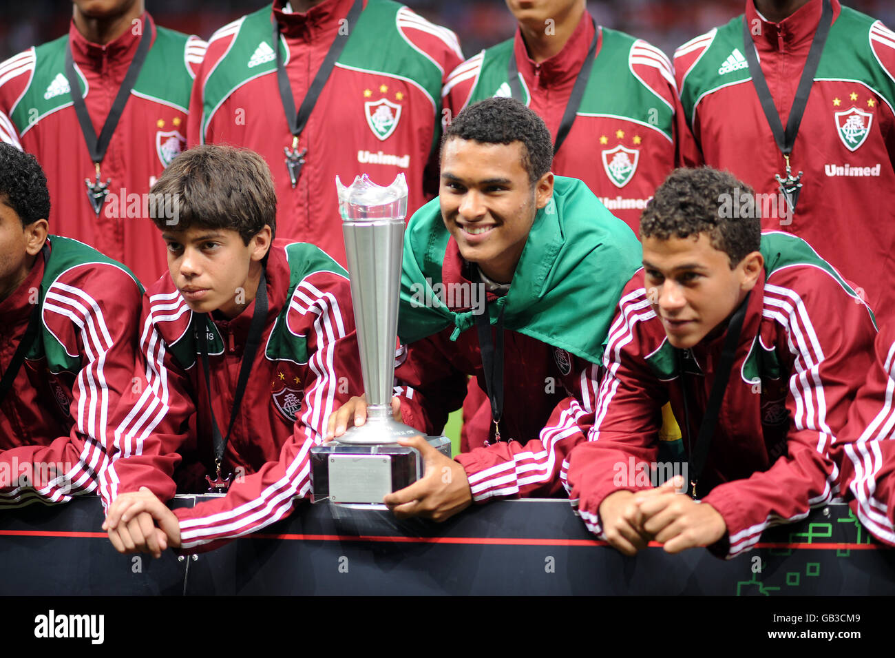 Players from Fluminense FC in Brazil, parade the Manchester United Premier Cup (MUPC) in front of the fans Stock Photo