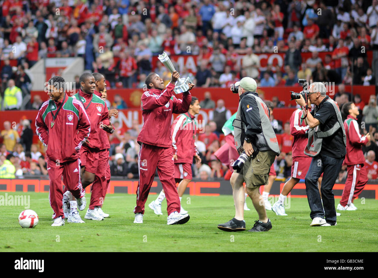 Players from Fluminense FC in Brazil, parade the Manchester United