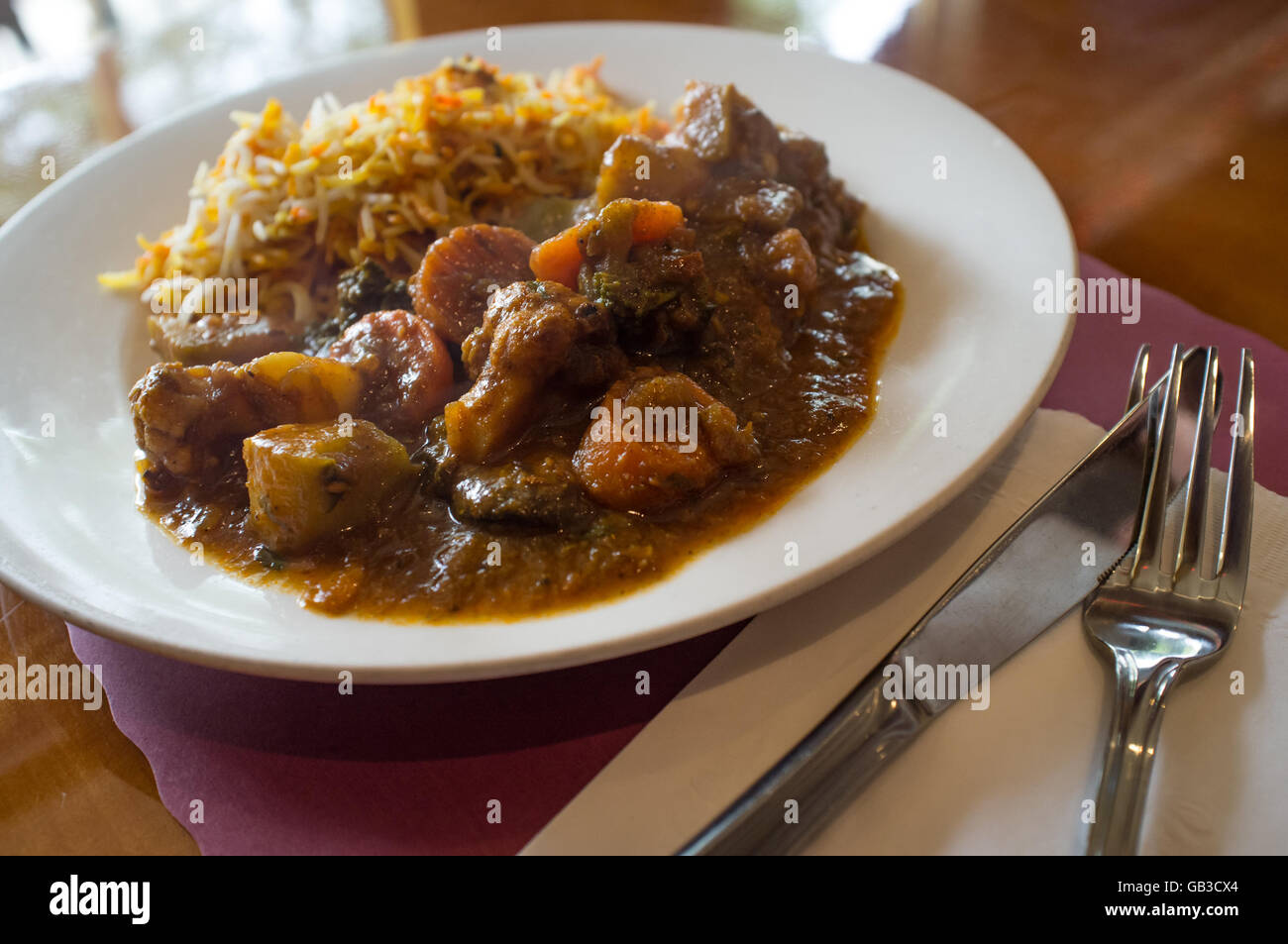 Spicy Indian vegetarian Kadai vegetable stew with jasmine rice Stock