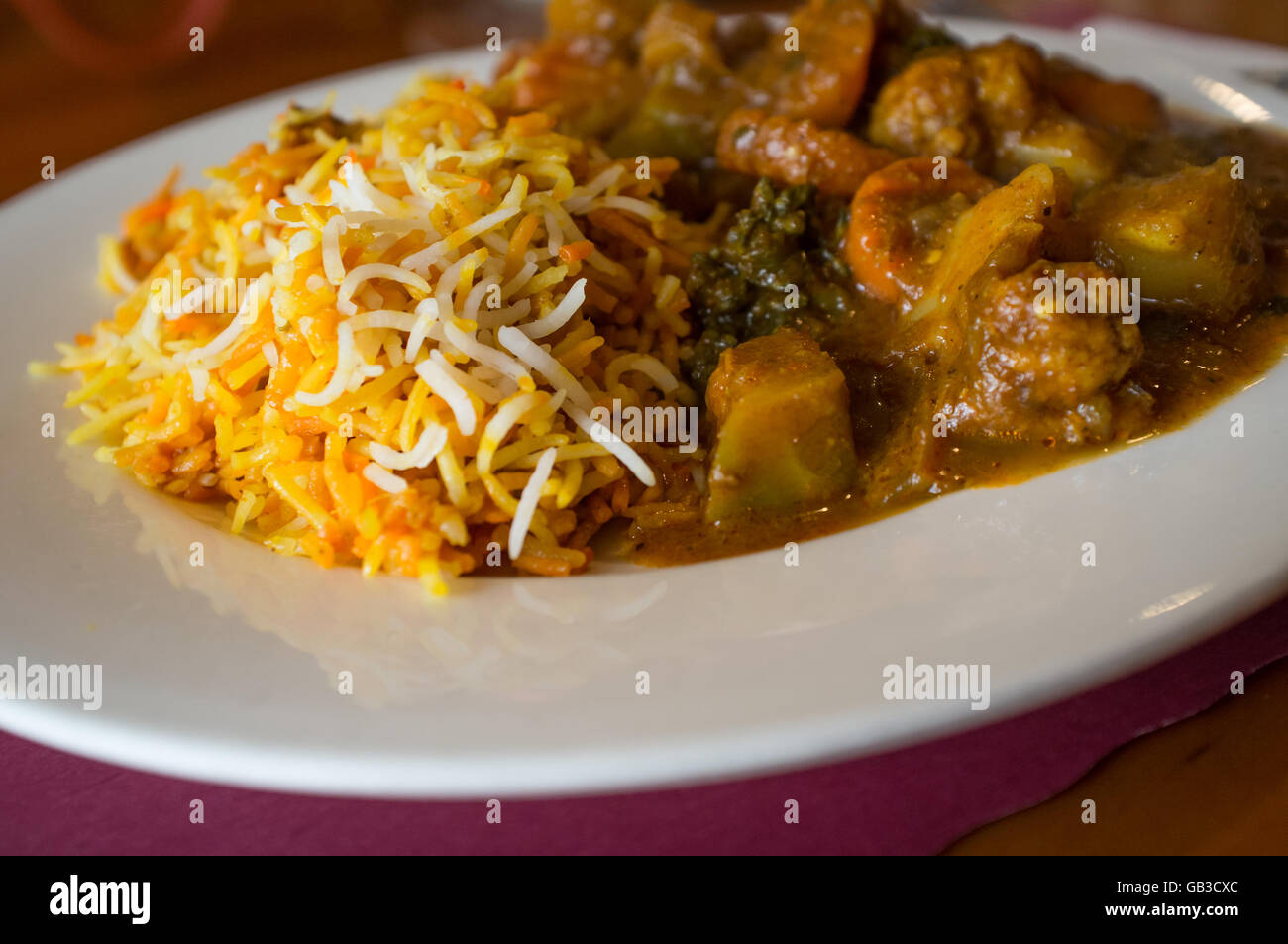 Spicy Indian vegetarian Kadai vegetable stew with jasmine rice Stock
