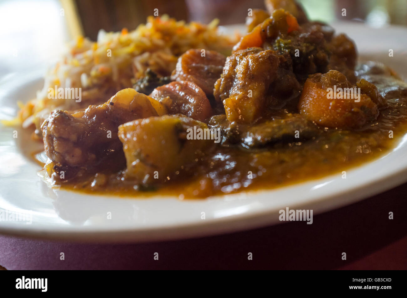 Spicy Indian vegetarian Kadai vegetable stew with jasmine rice Stock