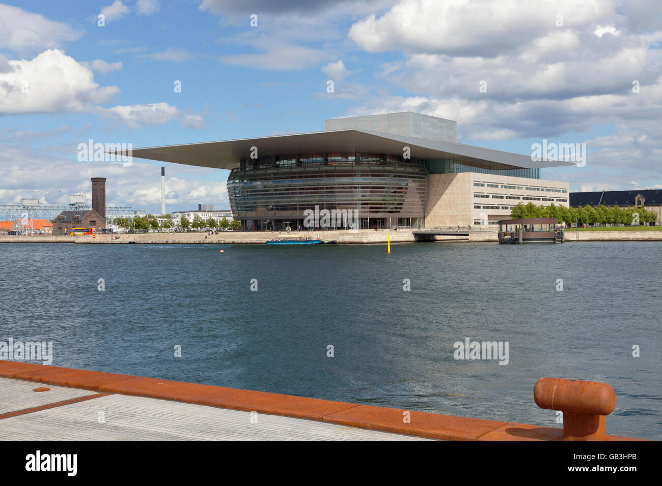 The Royal Opera House in Copenhagen seen from the quay of the new and exciting Kvaesthus Urban Space in Copenhagen Harbour. Donated by A.P. Møller. Stock Photo
