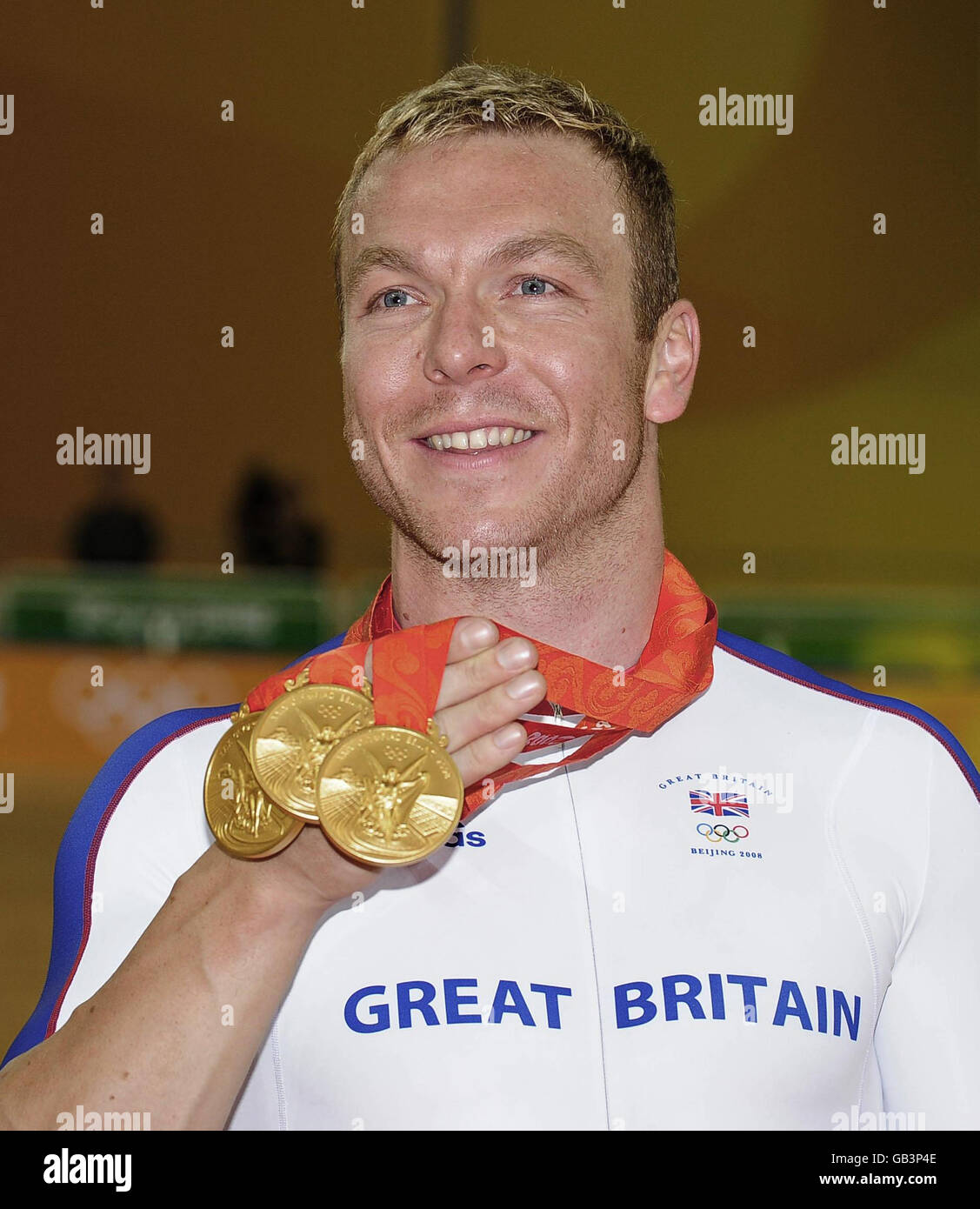 Great Britain's Chris Hoy with the three Gold Medals he has won at the