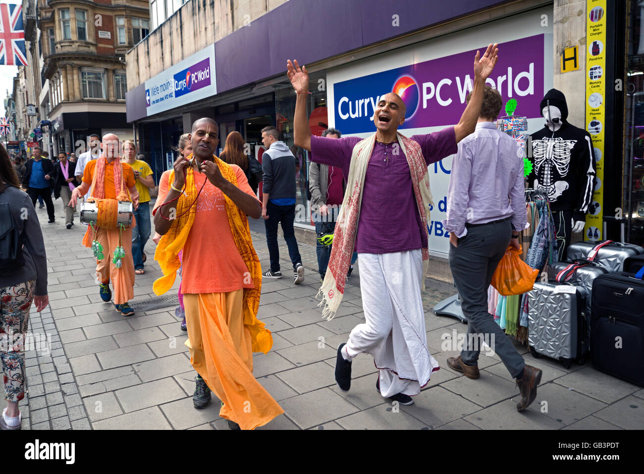 A group of Hare Krishna followers singing and chanting their way along Oxford Street in London. Stock Photo