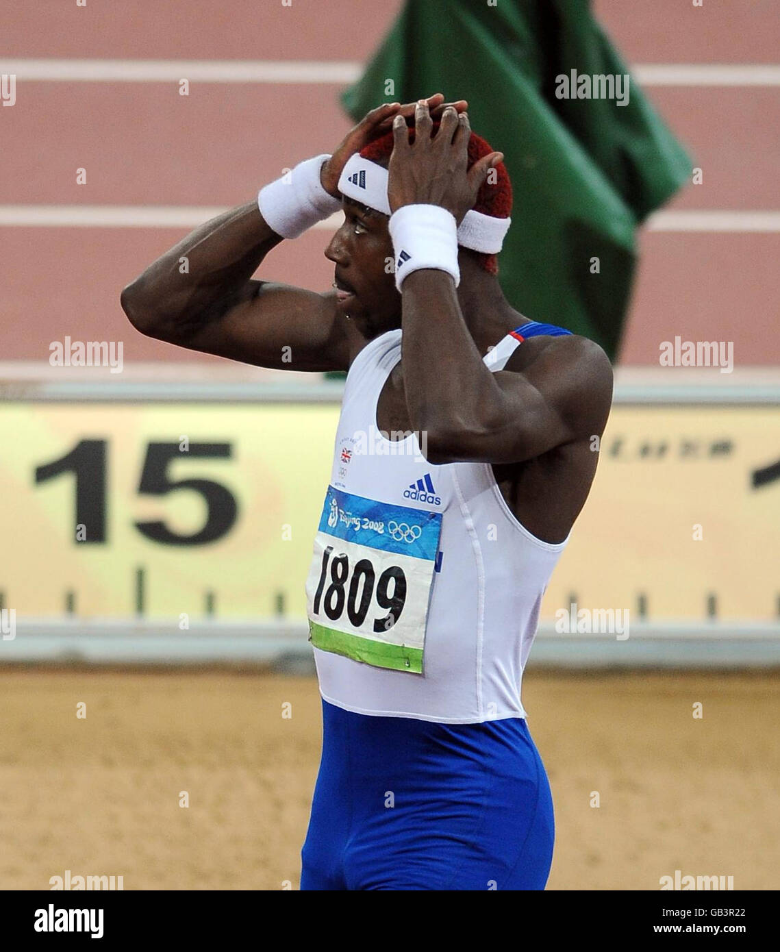Great Britain's Phillips Idowu during the Men's Triple Jump Final at the National Stadium in Beijing during the 2008 Beijing Olympic Games in China. Stock Photo