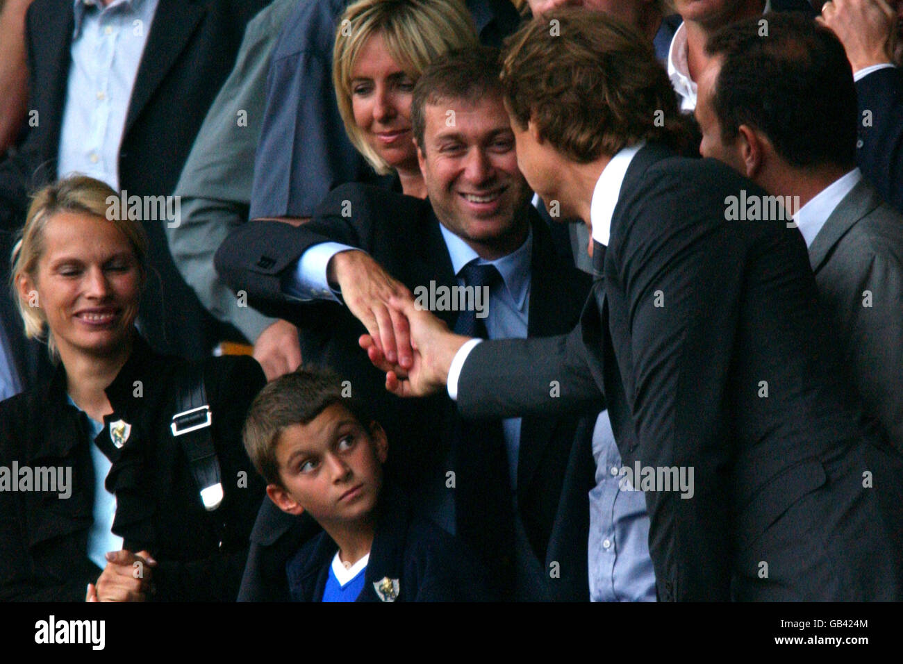 Chelsea owner Roman Abramovich (centre) with wife Irina and other