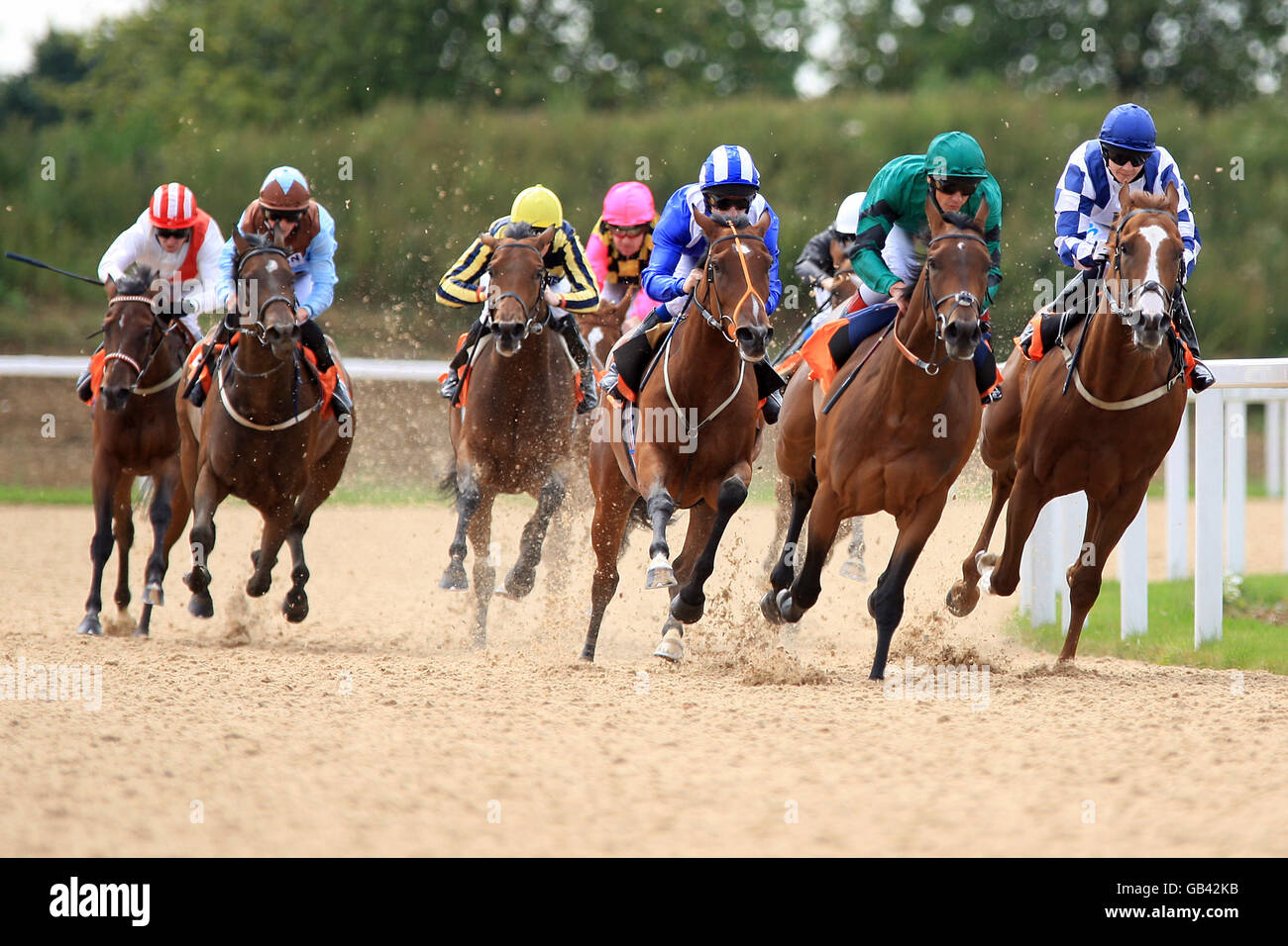 Jockey Frankie Dettori (2nd right) on Anne of Kiev leads the field in the Hatfield Perveral Maiden Fillies' Stakes at Great Leighs Racecourse Stock Photo