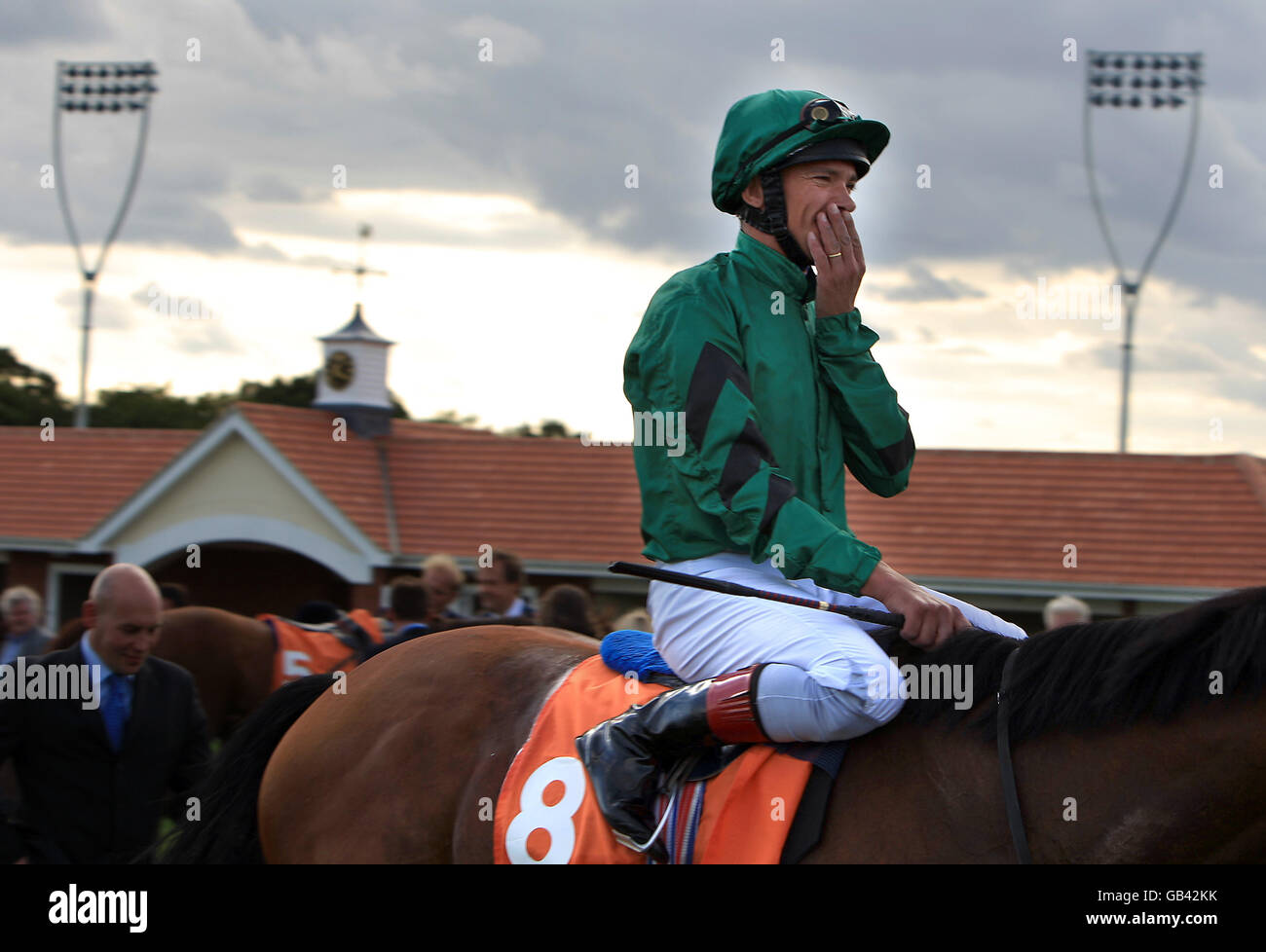 Jockey Fankie Dettori looks shocked after winning the Fairstead Handicap at Great leighs Racecourse Stock Photo