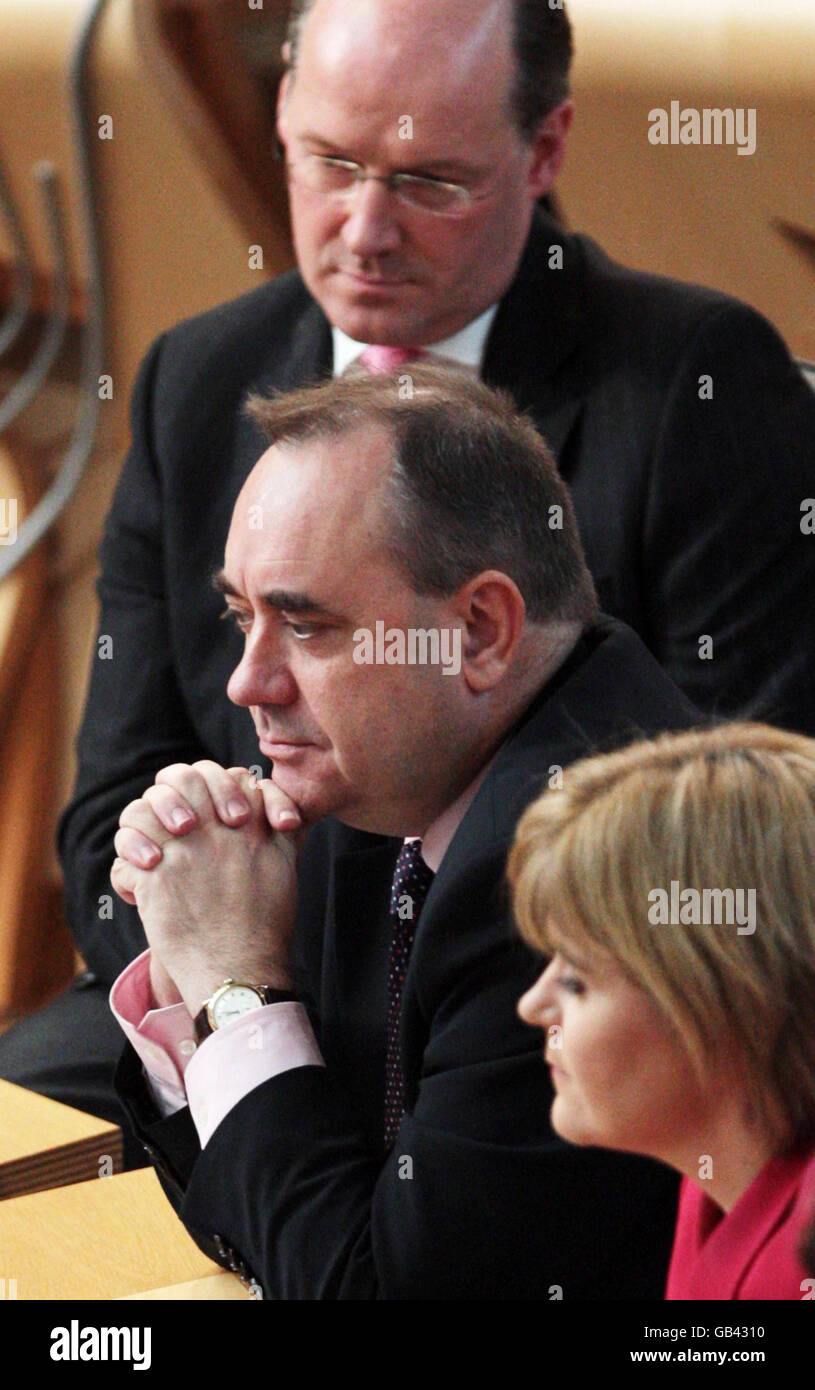 Scottish First Minister Alex Salmond (centre) takes questions at Question Time in the Scottish Parliament, Edinburgh. Stock Photo