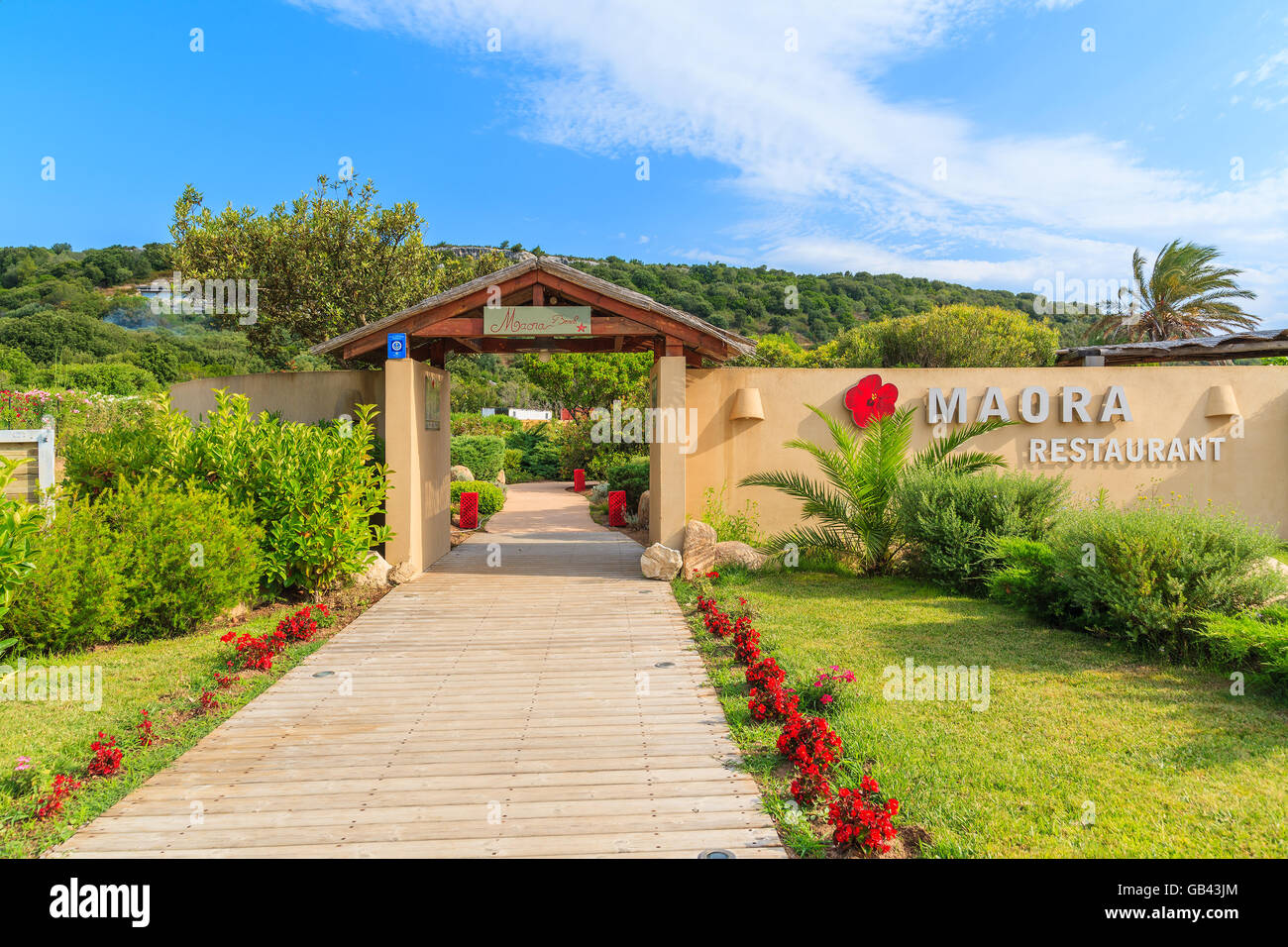 CORSICA ISLAND, FRANCE - JUN 23, 2015: Entrance gate to restaurant on Santa Manza beach which is located in southern part of Cor Stock Photo