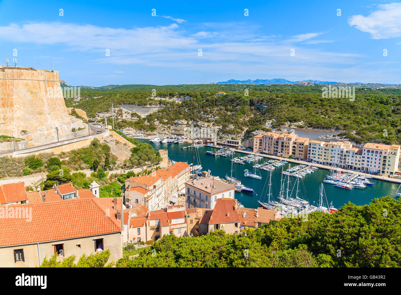 A view of Bonifacio port with colorful houses and boats, Corsica island, France. Stock Photo