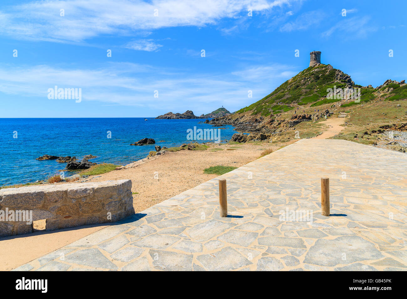 Coastal path to fortress tower on Cape de la Parata, Corsica island, France Stock Photo