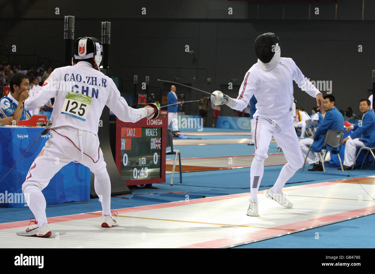 Great Britain's Sam Weale (right) in action against Zhongrong Cao of China in the Fencing Hall