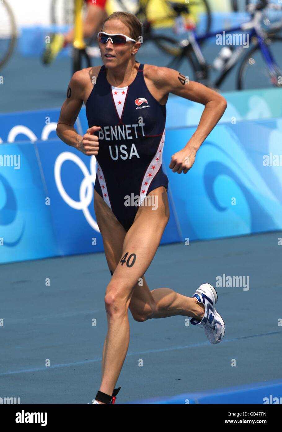 USA's Laura Bennett takes part in the running stage of the Women's Triathlon at the Ming Tomb Reservoir in Changping District of northern Beijing on day 10 of the 2008 Olympic Games in Beijing. Stock Photo