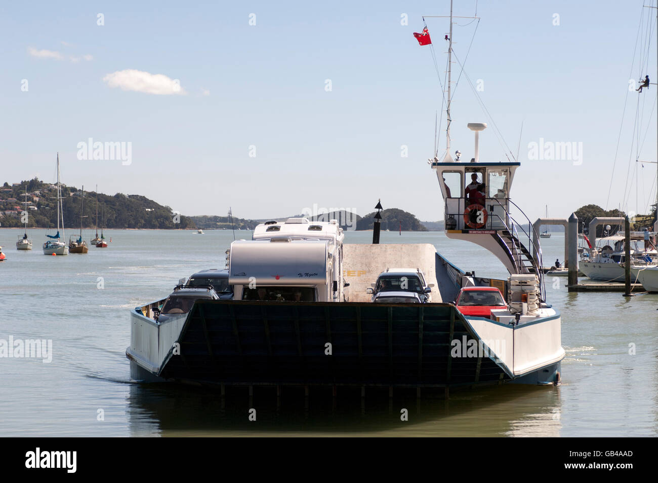 Opua to Russell Car Ferry approaching  Opua carrying Camper Vans and cars. Stock Photo