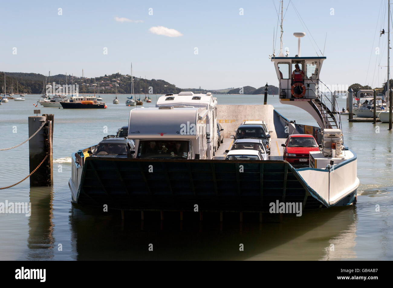 Opua to Russell Car Ferry approaching  Opua carrying Camper Vans and cars. Stock Photo