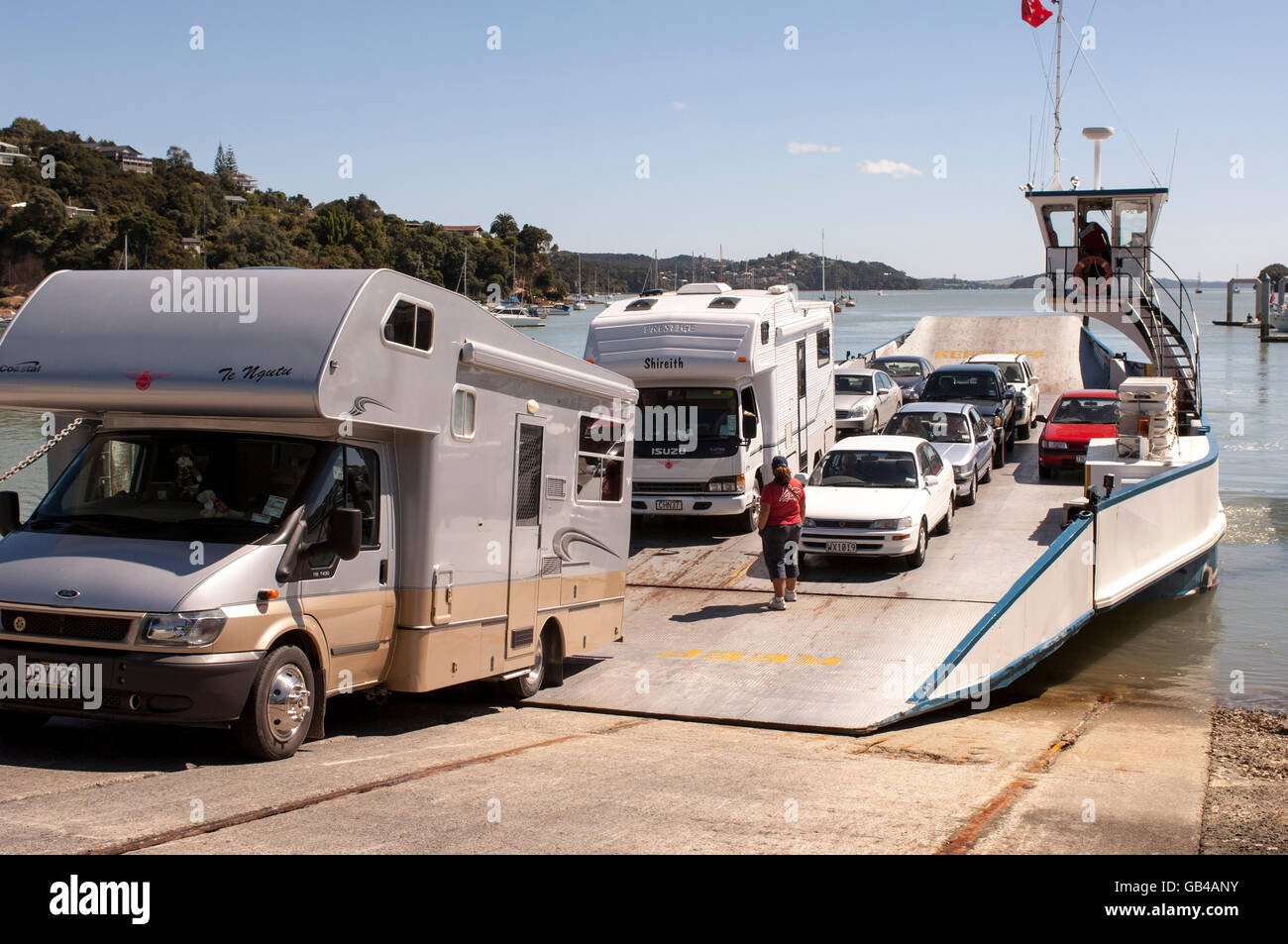 Opua to Russell Car Ferry  at  Opua unloading Camper Vans and cars. Stock Photo