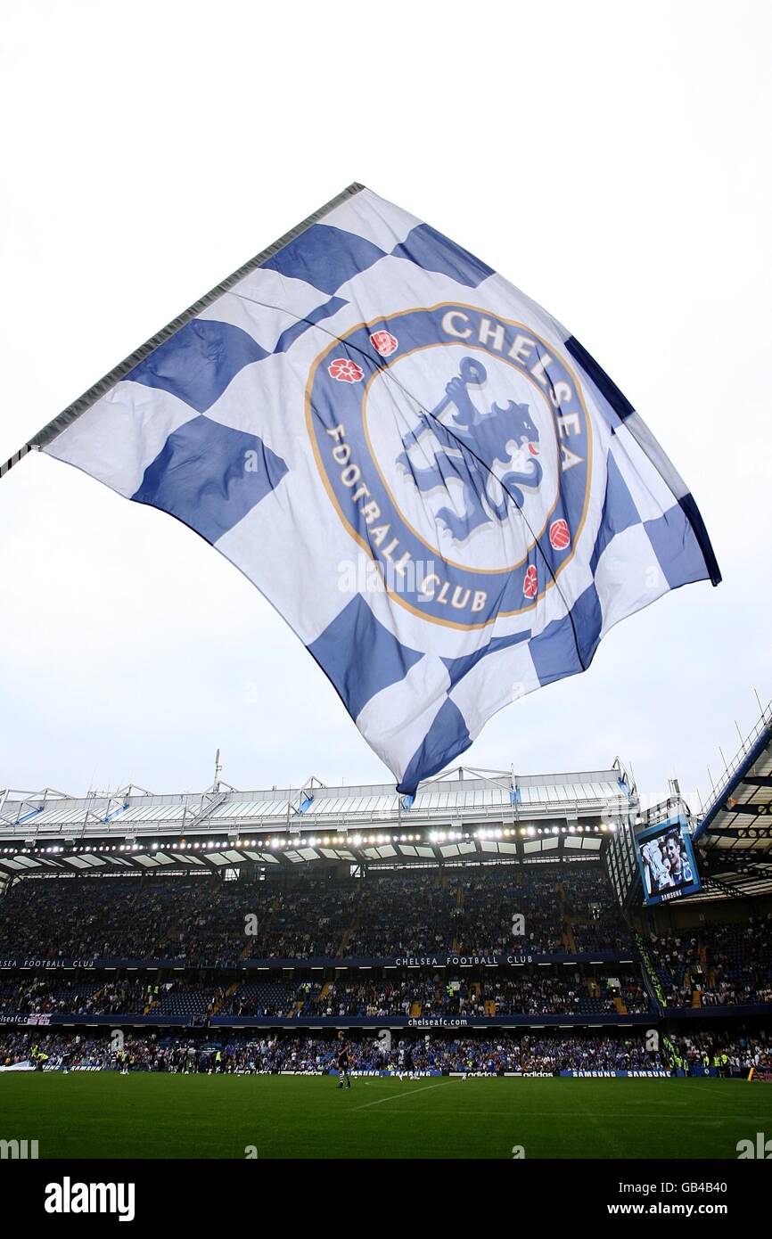 A Chelsea flag flutters in the breeze at Stamford Bridge, prior to kick off. Stock Photo