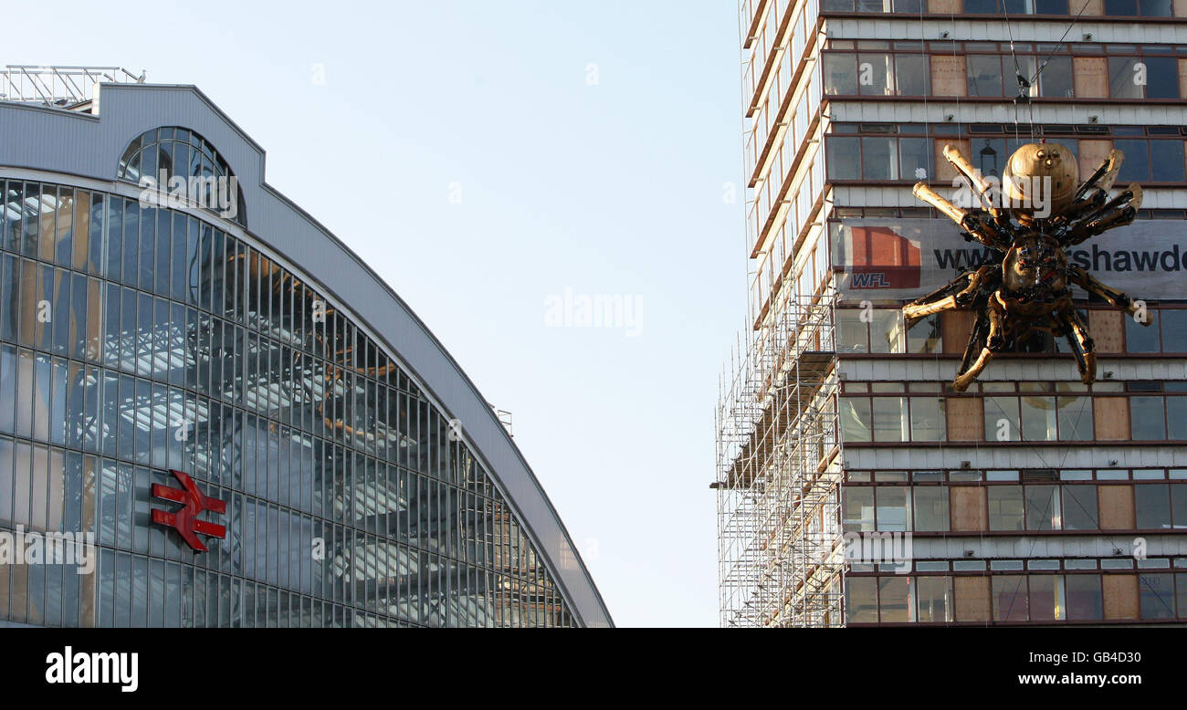 Giant spider hangs side concourse tower in liverpool mechanical spider