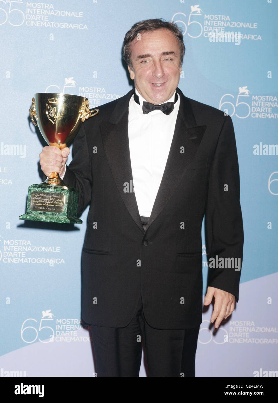 AP OUT Silvio Orlando with his Coppa Volpi Award for Best Actor, for his role in the film 'Il Papa Di Giovanna', during the closing night ceremony of the festival, at the Palazzo del Casino on Venice Lido, Italy. Stock Photo