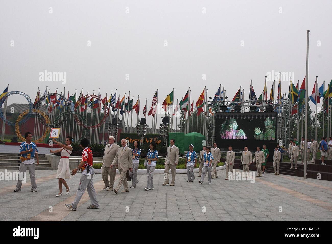 Ireland's Olympic team are lead to the flag raising ceremony at the
