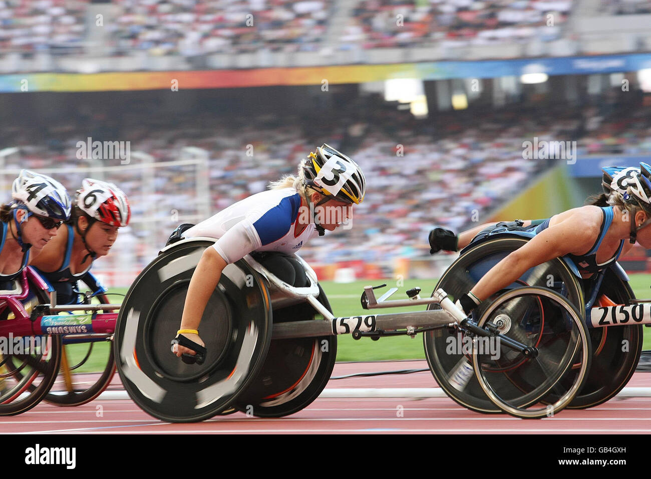 Great Britain's Shelley Woods (centre) wins bronze in the re-run of the women's 5000 meters T54 Final at the National Stadium during the Beijing Paralympic Games 2008, China. Stock Photo