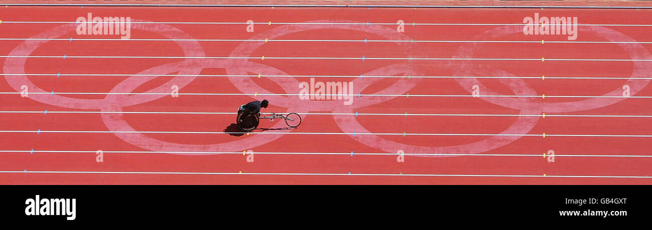 A general view of an athlete during the men's 200 meters Semi-Final T54 at the National Stadium during the Beijing Paralympic Games 2008, China. Stock Photo